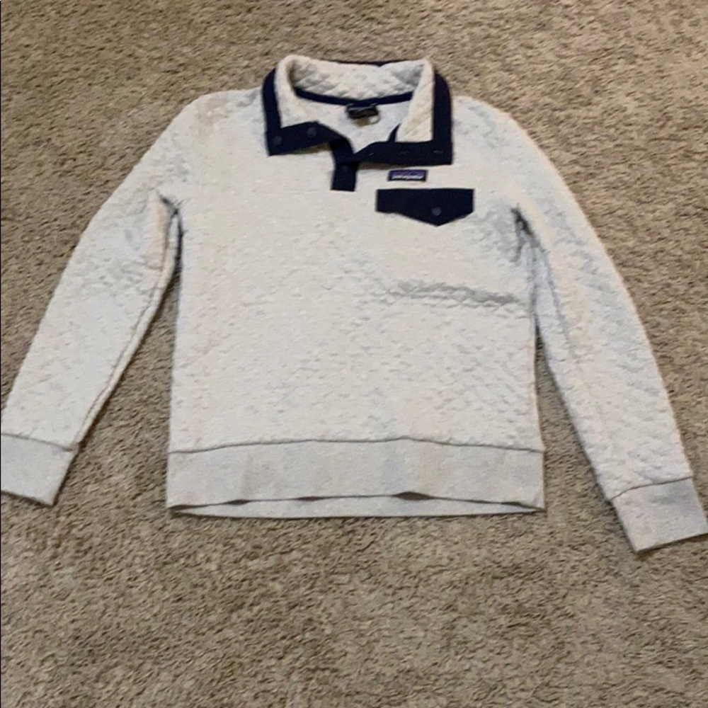 blue and light grey colored patagonia jacket